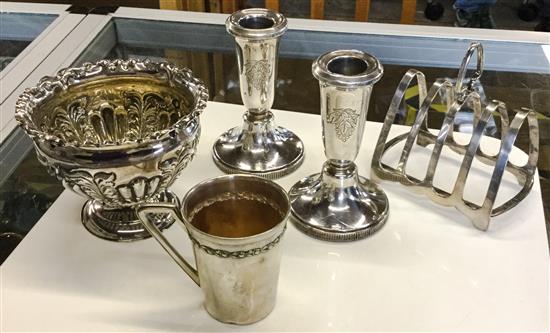 Pair of desk candlesticks, silver bowl, toastrack and German silver can